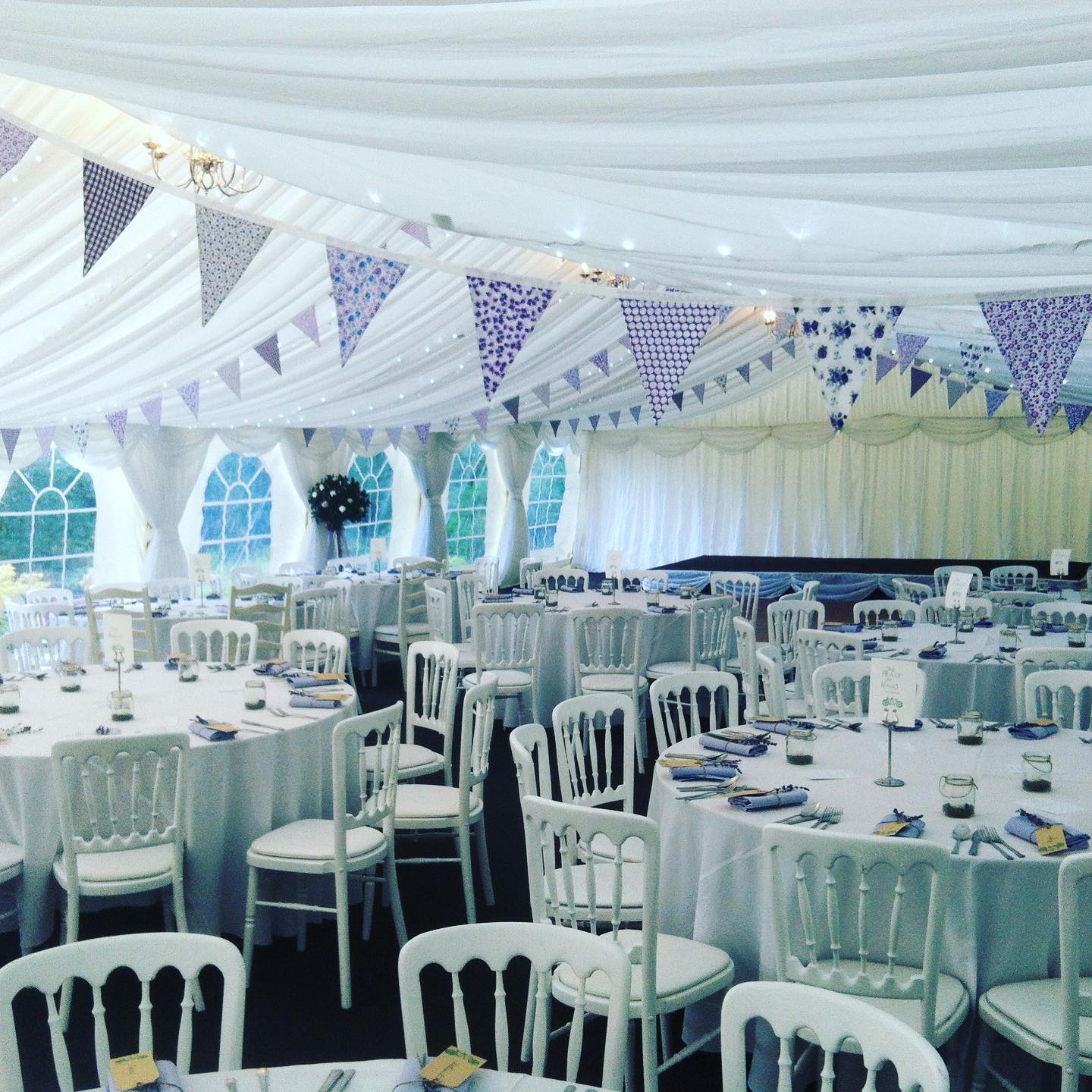 Purple Bunting inside a hired marquee in Essex